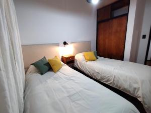 Ένα ή περισσότερα κρεβάτια σε δωμάτιο στο Alojamiento FB 1584