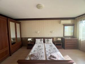 Postel nebo postele na pokoji v ubytování Guest House Slavyanka