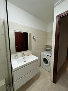 Et badeværelse på Appartement Nîmes, centre-ville