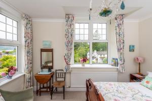 Ένα ή περισσότερα κρεβάτια σε δωμάτιο στο The Mount self-catering