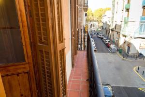 a view of a city street from a building at Happy People Plaza España Apartments in Barcelona
