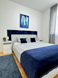 Postel nebo postele na pokoji v ubytování Ocean Apartment