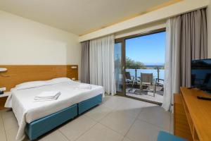 Voodi või voodid majutusasutuse ALEA Hotel & Suites toas