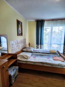 Posteľ alebo postele v izbe v ubytovaní Michałek w Rowach + 37 fotografií
