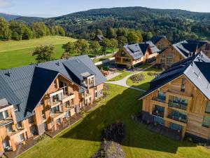 an aerial view of a group of houses at Aldrov Resort in Vítkovice