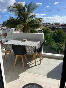 Balkón nebo terasa v ubytování Coral Terrasse