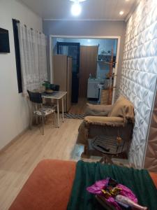 Posezení v ubytování Kitnet Guaíba Casa Nice