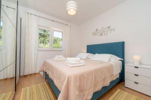 Posteľ alebo postele v izbe v ubytovaní Apartment for 4 persons, by the sea and with beautiful view