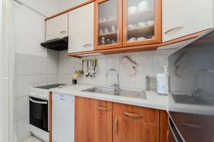 Kuchyňa alebo kuchynka v ubytovaní Apartment for 4 persons, by the sea and with beautiful view