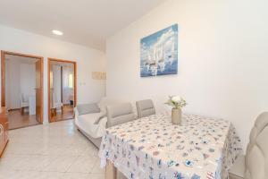Posedenie v ubytovaní Apartment for 4 persons, by the sea and with beautiful view