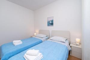 Posteľ alebo postele v izbe v ubytovaní Apartment for 4 persons, by the sea and with beautiful view