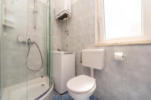 Kúpeľňa v ubytovaní Apartment for 4 persons, by the sea and with beautiful view