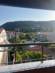 a view of a city from a balcony at Medusa Apartments in Katelios