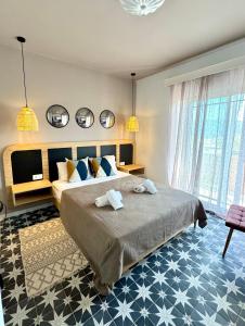 Postel nebo postele na pokoji v ubytování Levanta Apartment
