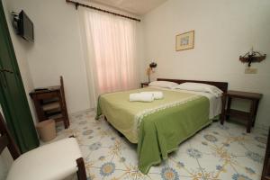 Postel nebo postele na pokoji v ubytování Hotel Don Pedro + 37 fotografií