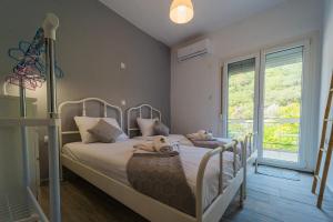 Ένα ή περισσότερα κρεβάτια σε δωμάτιο στο Panoramic Sea View Penthouse +16 φωτογραφίες