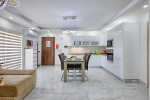 Kuchyň nebo kuchyňský kout v ubytování BF RESIDENCE