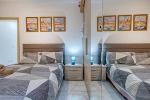 Postel nebo postele na pokoji v ubytování BF RESIDENCE