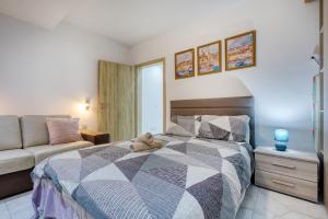 Postel nebo postele na pokoji v ubytování BF RESIDENCE