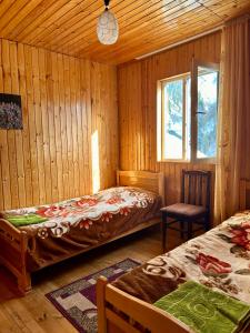 Postel nebo postele na pokoji v ubytování Bata GuesThouse