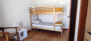 Ένα ή περισσότερα κρεβάτια σε δωμάτιο στο Casa próxima da praia fluvial