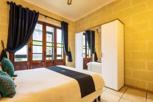 Voodi või voodid majutusasutuse Zest Holiday Home toas