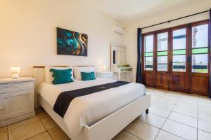 Voodi või voodid majutusasutuse Zest Holiday Home toas
