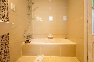 Vannituba majutusasutuses Zest Holiday Home