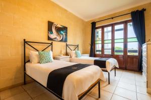 Voodi või voodid majutusasutuse Zest Holiday Home toas