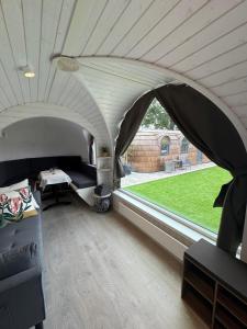 a room with a tent with a table in it at Franken Chalets in Kist +82 photos