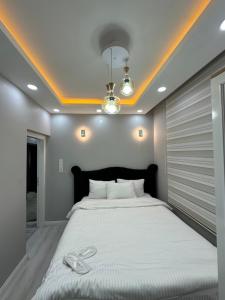 Postel nebo postele na pokoji v ubytování Sultanahmet Immortelle Apartment