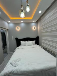 Postel nebo postele na pokoji v ubytování Sultanahmet Immortelle Apartment