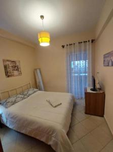 Ένα ή περισσότερα κρεβάτια σε δωμάτιο στο Beautiful small house