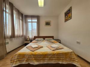 Ένα ή περισσότερα κρεβάτια σε δωμάτιο στο 2 Rooms Apartment - Top Center of Burgas