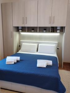 Ένα ή περισσότερα κρεβάτια σε δωμάτιο στο Casa Antonietta