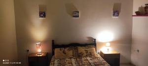 Postel nebo postele na pokoji v ubytování Bel appartement + 3 fotografie