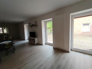 TV a/nebo společenská místnost v ubytování Ferienwohnung Hof Lanze