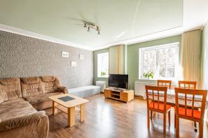 Televízia a/alebo spoločenská miestnosť v ubytovaní Apartmán u Petrů 1