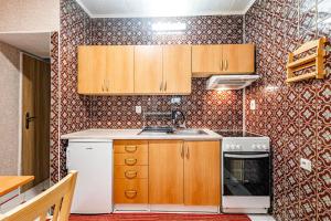 Kuchyňa alebo kuchynka v ubytovaní Apartmán u Petrů 1