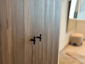 Postel nebo postele na pokoji v ubytování Comfy Studios Hotel