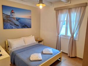 Postel nebo postele na pokoji v ubytování Captain Elias House