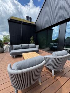 Posezení v ubytování Hotel Melfarhus