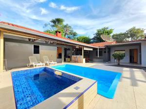 Foto de Casa Ampla Área de Lazer prox Centro e Cataratas