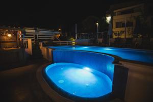 The swimming pool at or close to Bivalvia Apartments