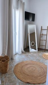 Μια τηλεόραση ή/και κέντρο ψυχαγωγίας στο AMBELI Luxury Apartment