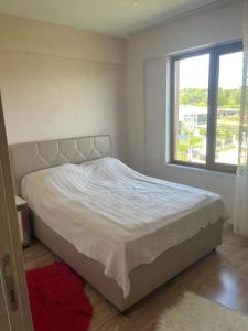 Ένα ή περισσότερα κρεβάτια σε δωμάτιο στο Apartment with sea views