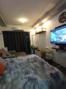 TV a/nebo společenská místnost v ubytování Staycation by ben