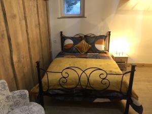 Postel nebo postele na pokoji v ubytování L'AUBERGE DES PYRENEES
