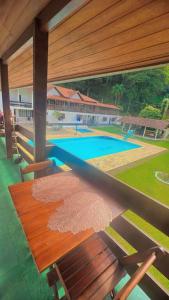 Bazén v ubytování Pousada Jequitibá nebo v jeho okolí