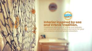 a poster for an interior inspired by sea and vitamin radiation at Gospoja Park & Beach Apartment Vrbnik in Vrbnik